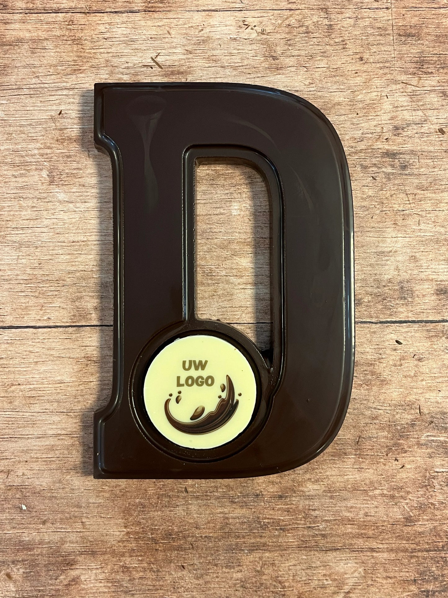 Schokoladenbuchstabe D mit Logo